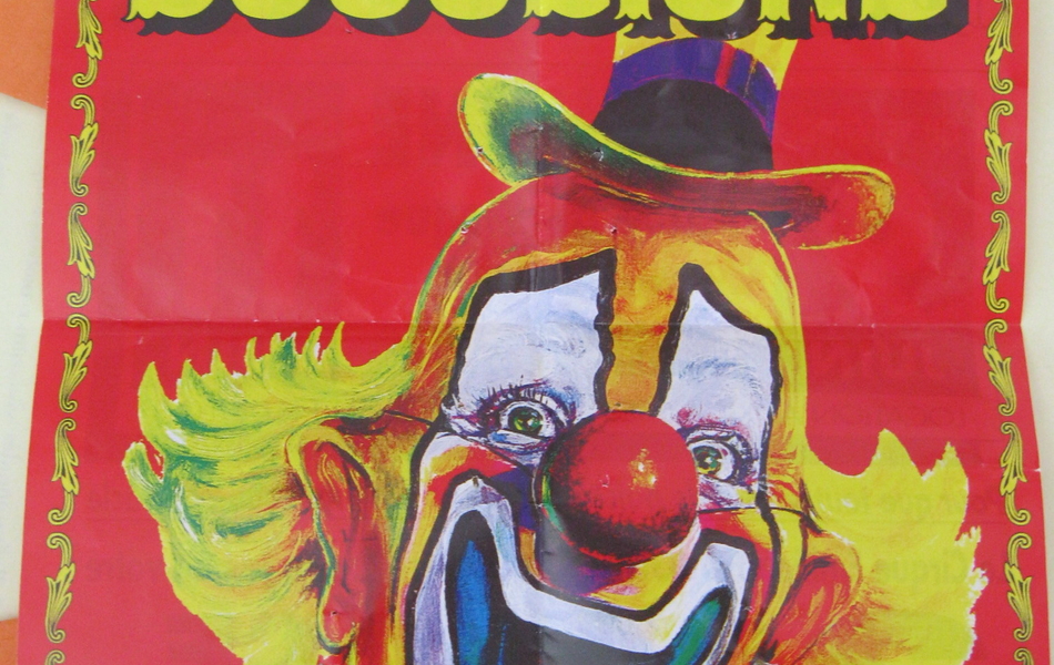 Affiche de cirque couleur illustrée d'un clown et sur laquelle on lit : "Les Falck présentent le roi du cirque, le cirque Émilien Bouglione".