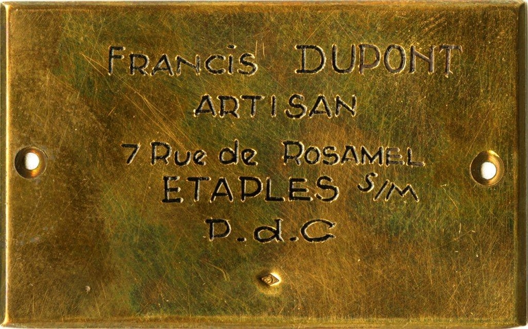 Poinçon sur lequel on lit: "FRANCIS DUPONT, ARTISAN, 7 Rue de ROSAMEL, ÉTAPLES, SIM, P.d.C".