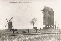 Carte postale noir et blanc représentant un moulin.